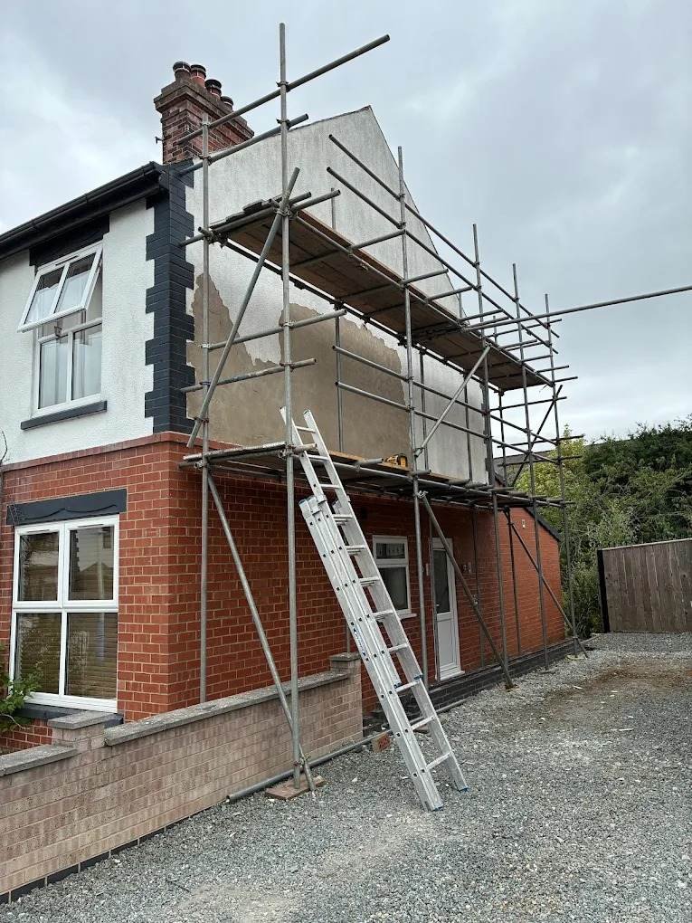 Lime render being applied to a period property gable in Hull